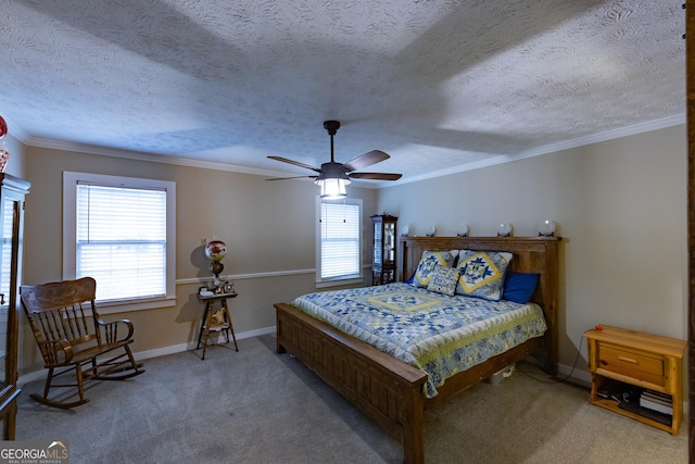 bedroom featuring carpet floors, ornamental molding, baseboards, and ceiling fan