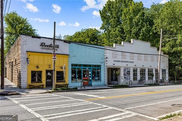view of property with uncovered parking