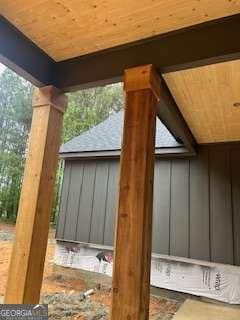 816 Proctor Rd, Rockmart, GA 30153 - exterior space with board and batten siding and decorative columns