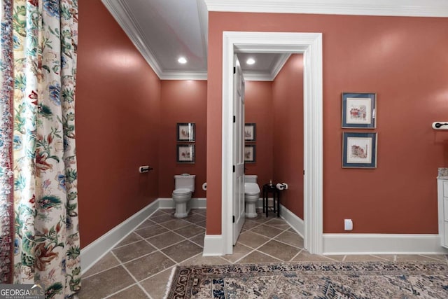 bathroom featuring recessed lighting, toilet, crown molding, baseboards, and tile patterned flooring