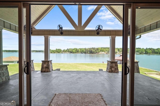 view of patio featuring a water view