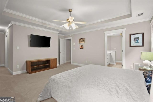 2995 Boulder Walk Ct SE, Atlanta, GA 30316 - bedroom with light carpet, ornamental molding, a raised ceiling, baseboards, and ensuite bath
