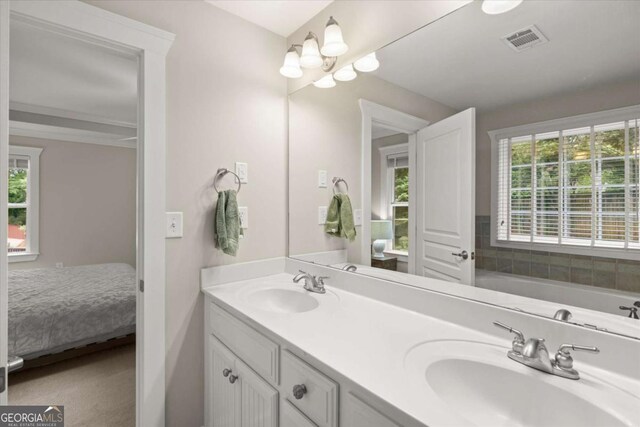 2995 Boulder Walk Ct SE, Atlanta, GA 30316 - ensuite bathroom featuring double vanity and a bathtub