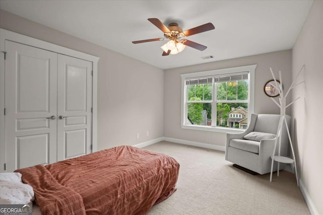 2995 Boulder Walk Ct SE, Atlanta, GA 30316 - bedroom featuring baseboards, light carpet, ceiling fan, and a closet