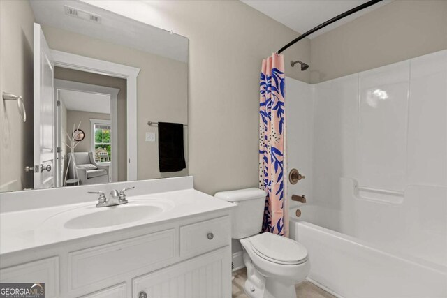 2995 Boulder Walk Ct SE, Atlanta, GA 30316 - full bath with toilet, shower / bath combo with shower curtain, and vanity