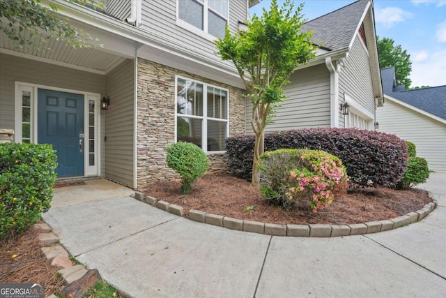2995 Boulder Walk Ct SE, Atlanta, GA 30316 - entrance to property featuring stone siding and roof with shingles