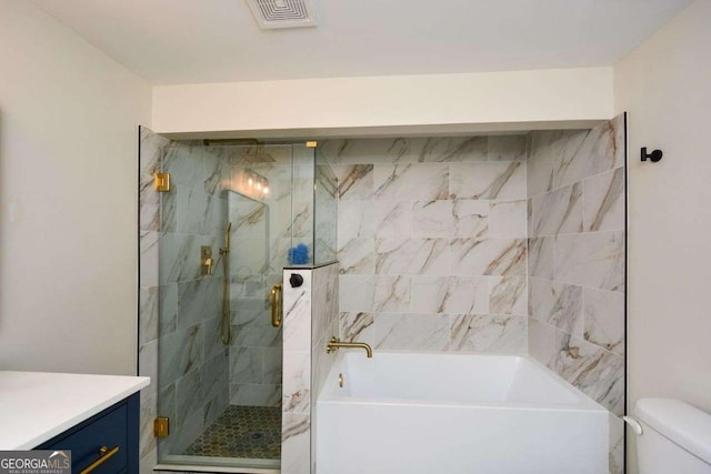 full bath with visible vents, a stall shower, a tub, toilet, and vanity