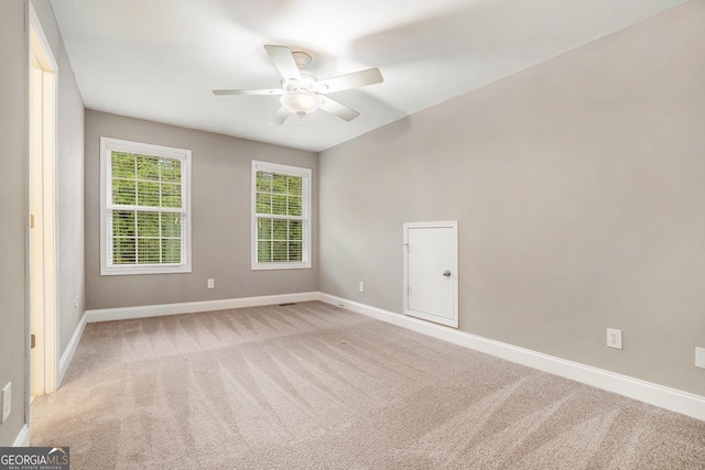71 Anita Pl SE, Mableton, GA 30126 - unfurnished room with light colored carpet and a ceiling fan