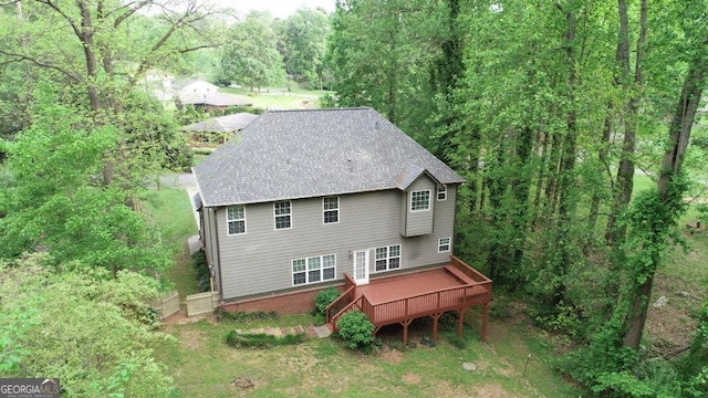 71 Anita Pl SE, Mableton, GA 30126 - rear view of property featuring a wooden deck, a shingled roof, and a forest view