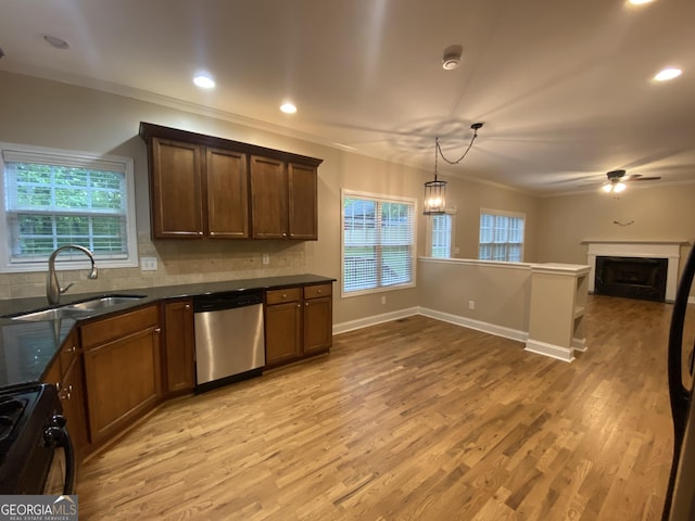 71 Anita Pl SE, Mableton, GA 30126 - kitchen with dishwasher, black range with gas cooktop, dark countertops, open floor plan, and ceiling fan