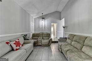 1824 Guardian Way, Lawrenceville, GA 30043 - living room with light tile patterned flooring and lofted ceiling