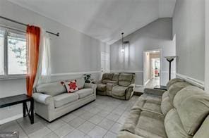 1824 Guardian Way, Lawrenceville, GA 30043 - living area with light tile patterned floors, vaulted ceiling, and baseboards