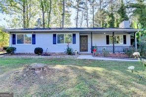 1824 Guardian Way, Lawrenceville, GA 30043 - ranch-style house with a chimney, a porch, and a front lawn