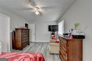 1824 Guardian Way, Lawrenceville, GA 30043 - bedroom with baseboards and light wood-style floors