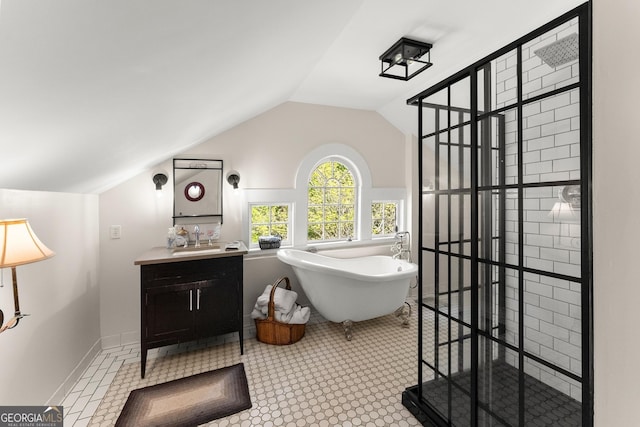 19 Oak Creek Cir, Toccoa, GA 30577 - full bath featuring a soaking tub, baseboards, vaulted ceiling, a walk in shower, and vanity