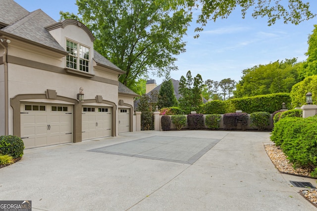 8345 Jett Ferry Rd, Sandy Springs, GA 30350 - garage with concrete driveway