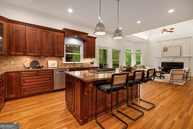 8345 Jett Ferry Rd, Sandy Springs, GA 30350 - kitchen featuring dishwasher, open floor plan, recessed lighting, backsplash, and plenty of natural light