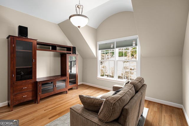 8345 Jett Ferry Rd, Sandy Springs, GA 30350 - living room with plenty of natural light, lofted ceiling, and light wood-type flooring