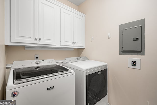 8345 Jett Ferry Rd, Sandy Springs, GA 30350 - washroom with electric panel, independent washer and dryer, and cabinet space