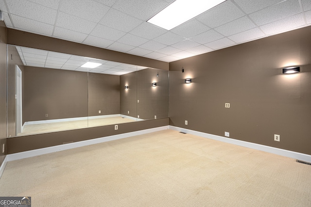 8345 Jett Ferry Rd, Sandy Springs, GA 30350 - carpeted spare room featuring baseboards and a drop ceiling