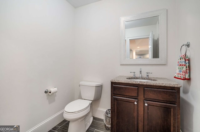 8345 Jett Ferry Rd, Sandy Springs, GA 30350 - bathroom featuring vanity and toilet