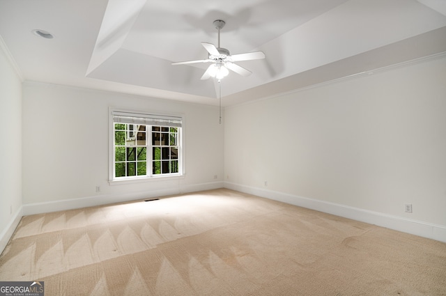 8345 Jett Ferry Rd, Sandy Springs, GA 30350 - spare room with a raised ceiling, carpet, ceiling fan, and crown molding