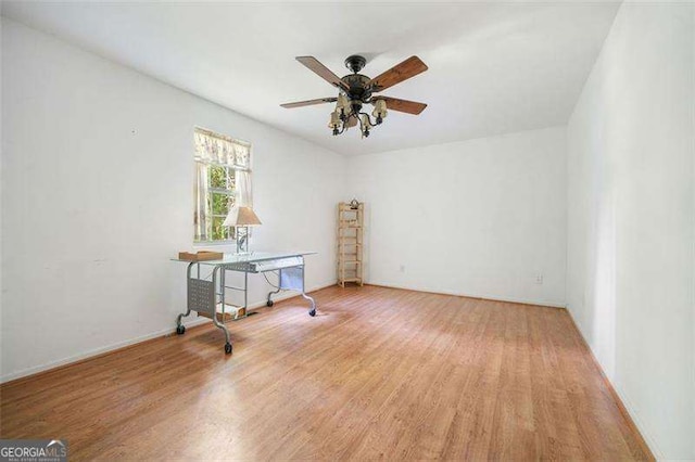 3420 Honeysuckle Ln, Lithia Springs, GA 30122 - empty room featuring wood finished floors and ceiling fan
