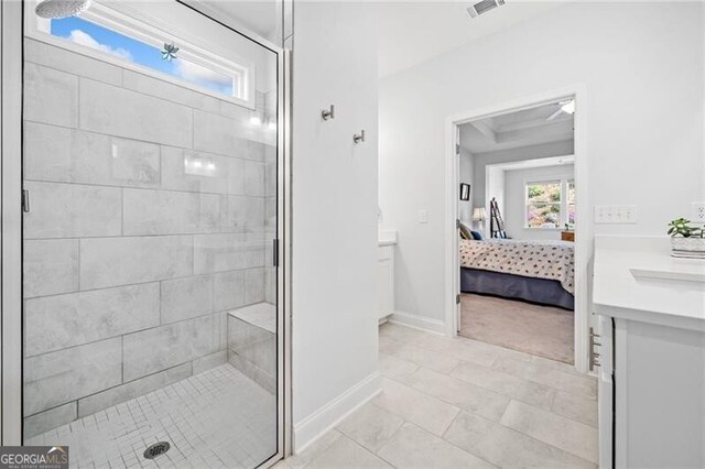 221 Hickory Bluffs Pkwy, Canton, GA 30114 - ensuite bathroom featuring ensuite bath, a shower stall, vanity, baseboards, and visible vents