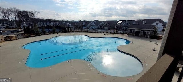 221 Hickory Bluffs Pkwy, Canton, GA 30114 - community pool with a patio and a residential view