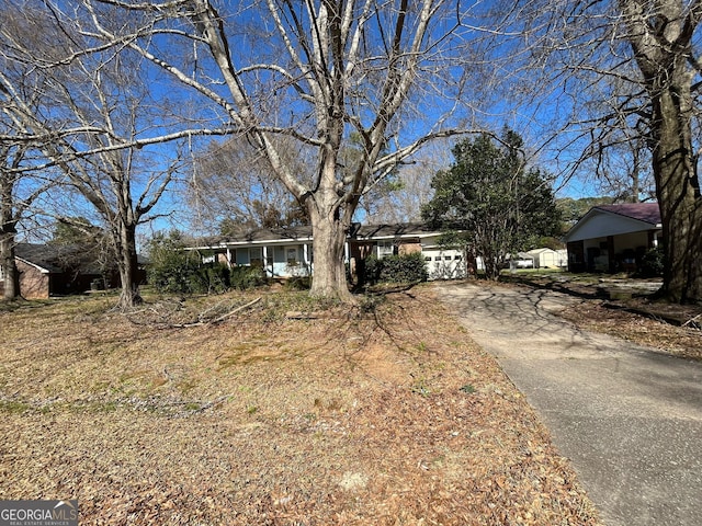 view of front of home with driveway and an attached garage