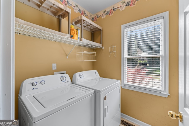 9255 Old Preserve Trl, Ball Ground, GA 30107 - laundry area featuring washing machine and dryer and baseboards