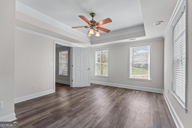 9255 Old Preserve Trl, Ball Ground, GA 30107 - empty room with dark wood-type flooring, ornamental molding, a tray ceiling, and ceiling fan