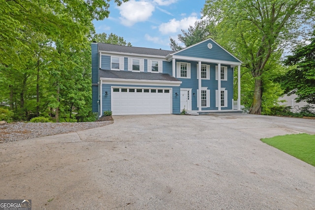 3757 Peachtree Corners Cir, Peachtree Corners, GA 30092 - greek revival inspired property featuring a porch, driveway, an attached garage, and a chimney