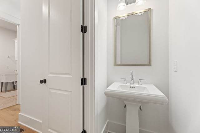9135 Greenway Ct, Gainesville, GA 30506 - bathroom featuring wood finished floors and baseboards