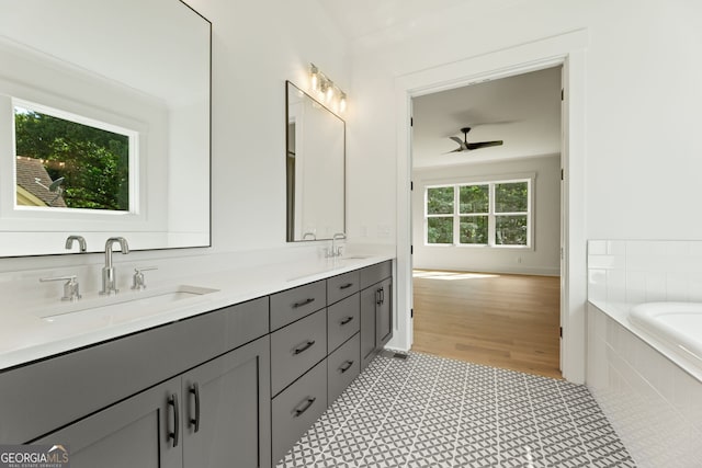 9135 Greenway Ct, Gainesville, GA 30506 - full bathroom with double vanity, a relaxing tiled tub, and tile patterned flooring