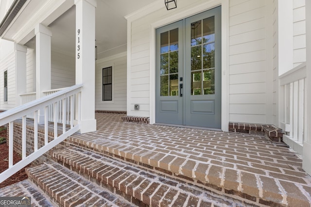 9135 Greenway Ct, Gainesville, GA 30506 - property entrance featuring french doors and covered porch