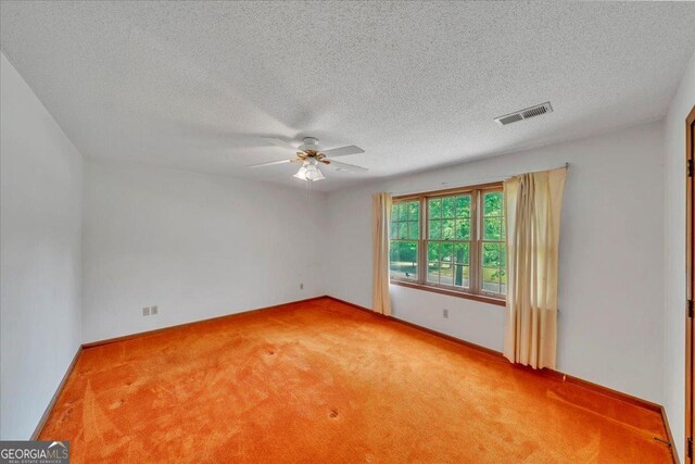 208 Earlwood Dr, Dublin, GA 31021 - unfurnished room with a ceiling fan, visible vents, light colored carpet, and baseboards