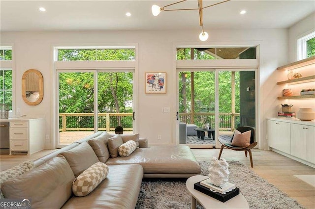3006 Skyland Dr NE, Brookhaven, GA 30341 - living room with recessed lighting and light wood finished floors