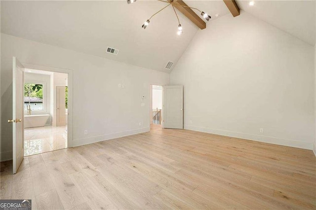 3006 Skyland Dr NE, Brookhaven, GA 30341 - interior space with baseboards, light wood-style flooring, beam ceiling, visible vents, and high vaulted ceiling
