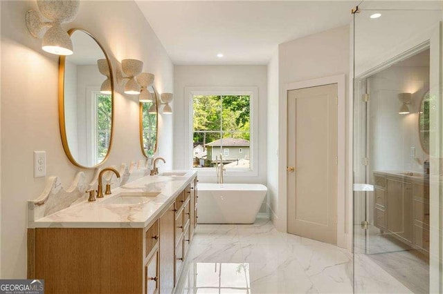 3006 Skyland Dr NE, Brookhaven, GA 30341 - full bathroom featuring recessed lighting, double vanity, a sink, and a freestanding bath