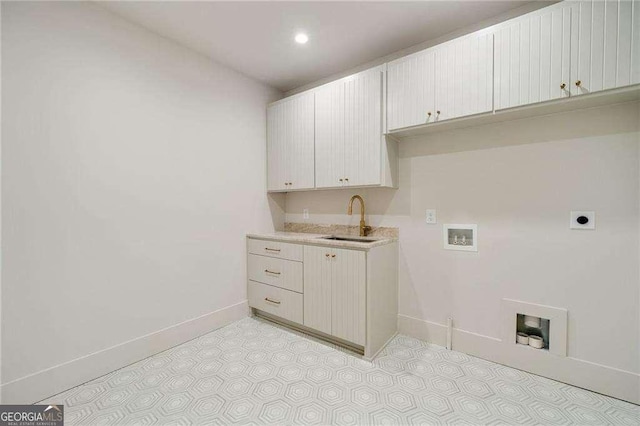 3006 Skyland Dr NE, Brookhaven, GA 30341 - clothes washing area featuring a sink, cabinet space, washer hookup, electric dryer hookup, and baseboards