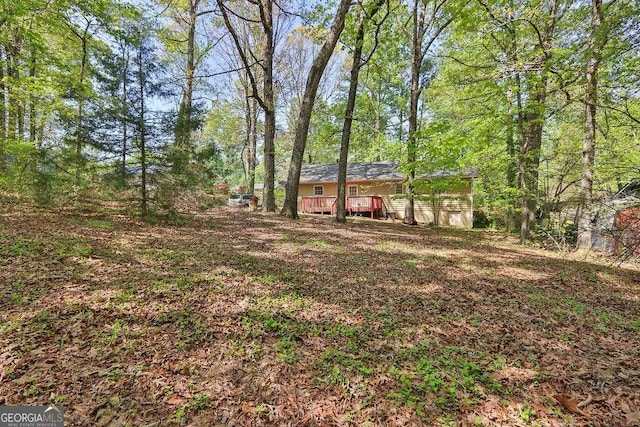4850 Forest Blvd, Gainesville, GA 30506 - view of yard featuring a deck