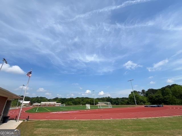 834 S Columbia Dr, Decatur, GA 30030 - view of tennis court featuring an area for sports