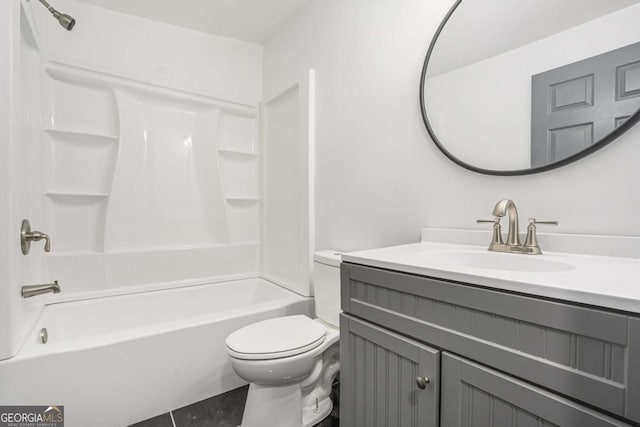 1477 Olive St SW, Atlanta, GA 30310 - full bath featuring toilet, vanity, shower / bathtub combination, and tile patterned flooring