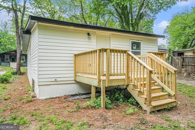1477 Olive St SW, Atlanta, GA 30310 - rear view of house with a deck and fence
