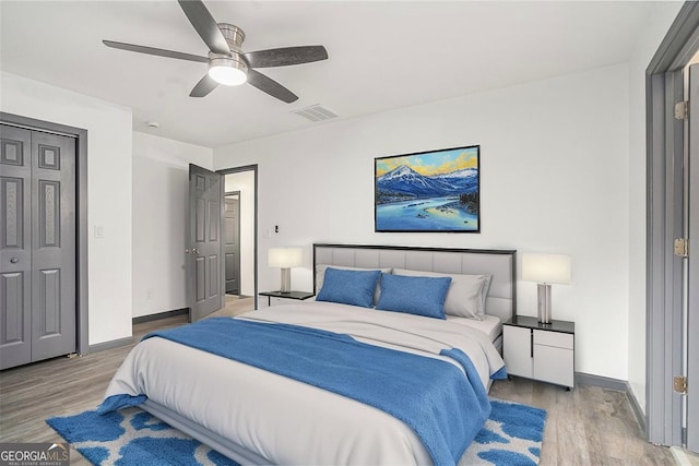 1477 Olive St SW, Atlanta, GA 30310 - bedroom featuring wood finished floors, baseboards, and a ceiling fan