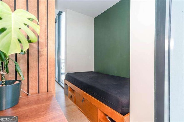 3040 Peachtree Rd NW Unit 815, Atlanta, GA 30305 - bedroom with light wood-style flooring