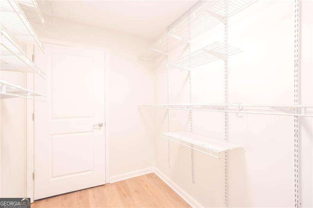 3040 Peachtree Rd NW Unit 815, Atlanta, GA 30305 - spacious closet featuring light wood finished floors