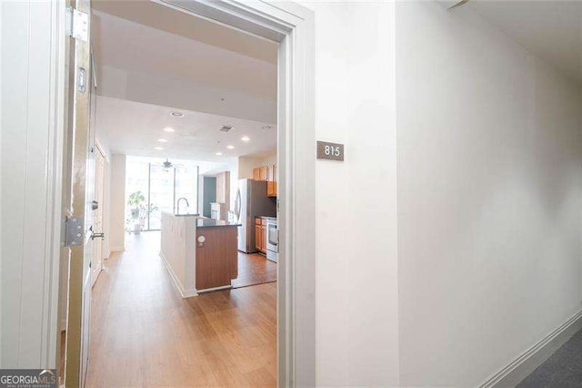 3040 Peachtree Rd NW Unit 815, Atlanta, GA 30305 - hall with light wood-style floors and recessed lighting