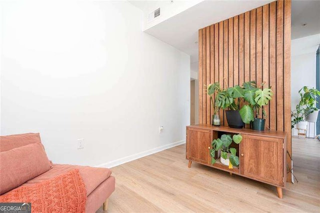 3040 Peachtree Rd NW Unit 815, Atlanta, GA 30305 - living area with light wood-type flooring and baseboards